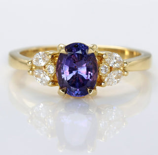 Handmade 18ct gold oval purple sapphire and diamond cluster engagement ring
