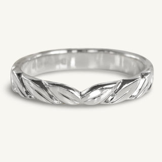 3mm wide 950 platinum wedding ring with hand engraved leaves carved out of the front of the band