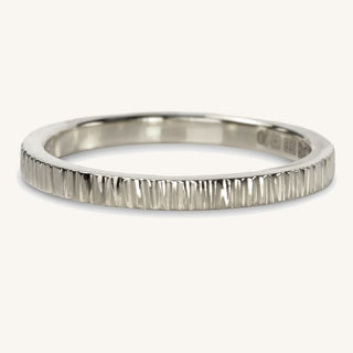 950 platinum slim wedding band with a hand textured tree bark finish