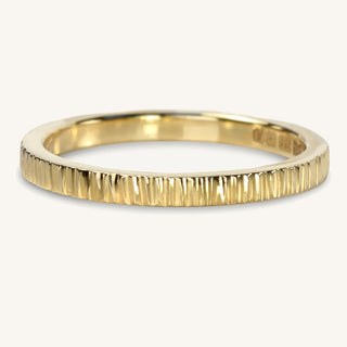Handmade slim 18ct gold wedding ring with a hammered tree bark texture