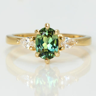 Veryan 18ct gold fair trade oval Parti sapphire trilogy ring with pear cut side diamonds, handmade in Cornwall by Lilia Nash