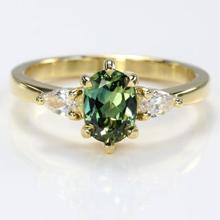 18ct gold oval parti sapphire and pear cut diamond trilogy engagement ring,handmade by Lilia Nash