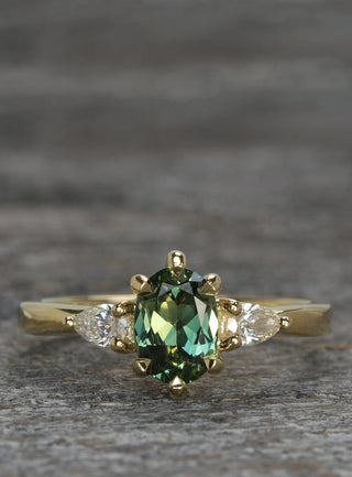 18ct gold green sapphire and diamond trilogy engagement ring