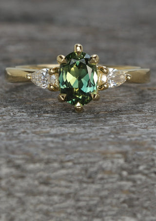 18ct gold green sapphire and diamond trilogy engagement ring