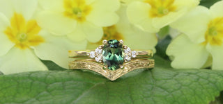 18ct gold green sapphire and diamond cluster engagement ring and orange blossom hand engraved wedding band