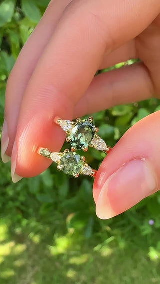 Video of Veryan and Pentillie 18ct gold  green sapphire and diamond trilogy rings