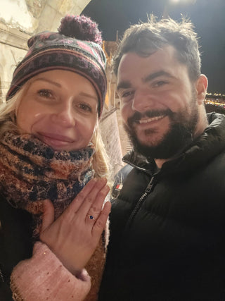Harley and Natalie's proposal in Hungary with a Lilia Nash bespoke Ceylon Sapphire and diamond engagement ring