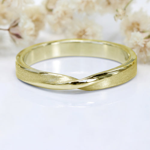 Twisted yellow gold hot sale wedding band