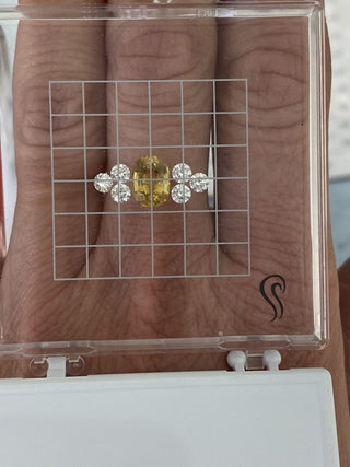 Luxury bespoke yellow sapphire cluster engagement ring with diamonds, handmade in Cornwall UK.