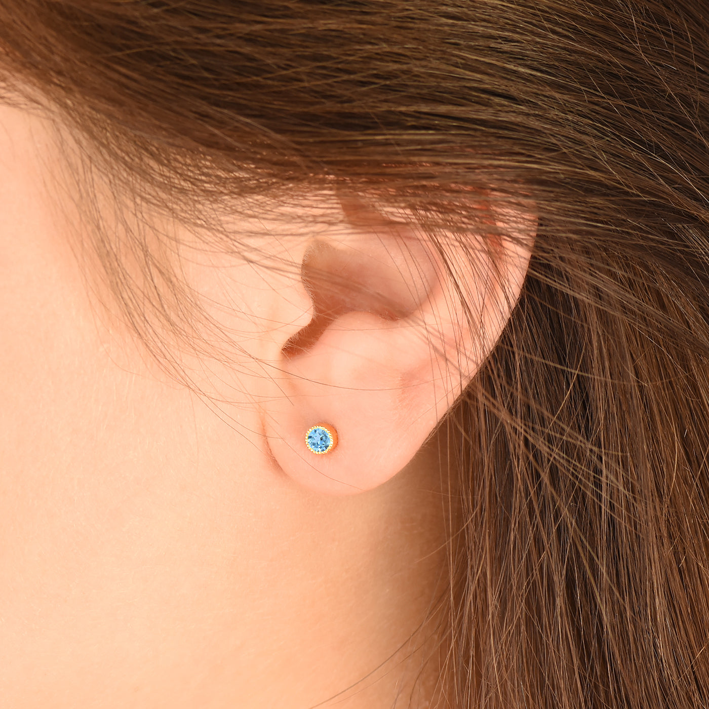 blue topaz stud earrings 18ct gold