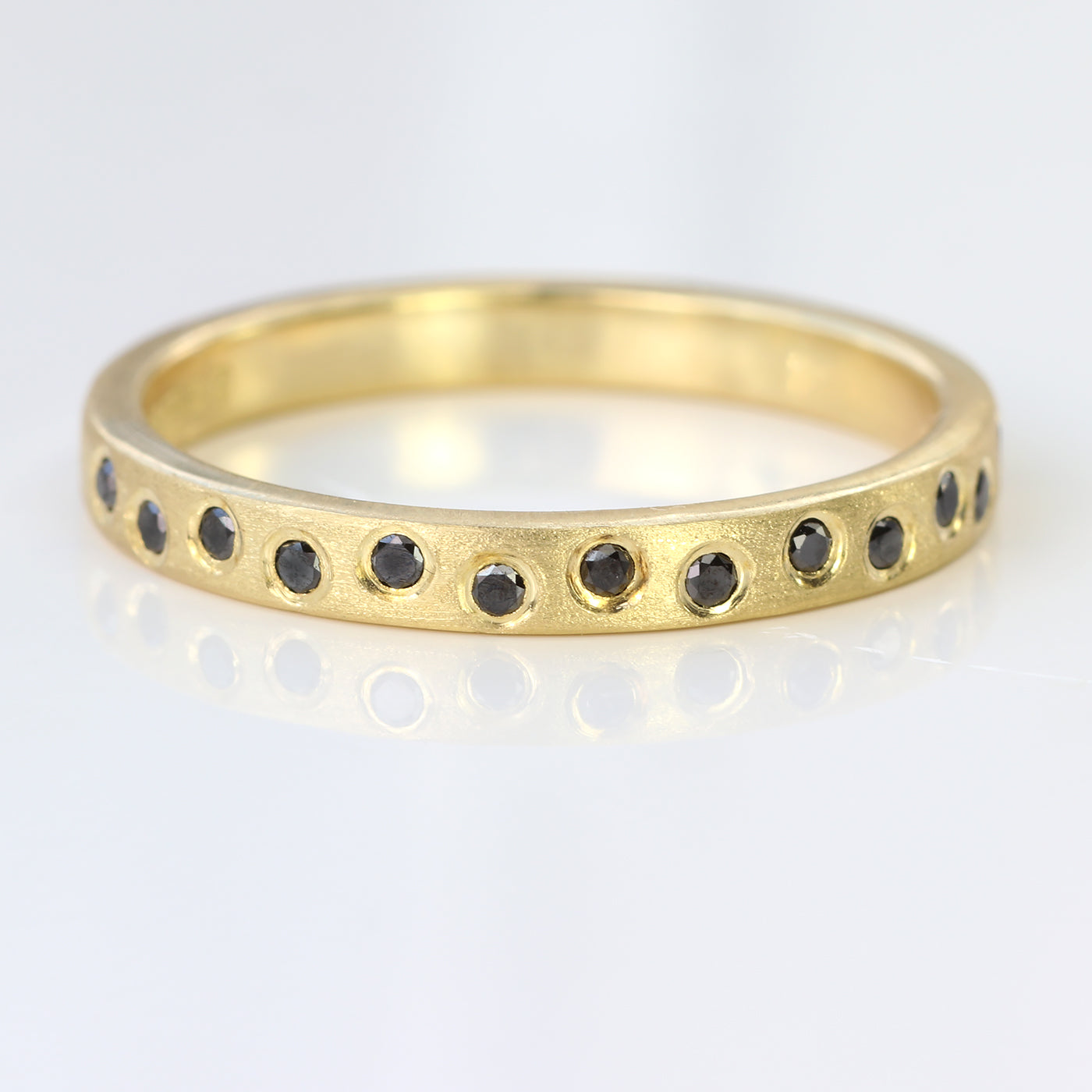 black diamond eternity ring yellow gold