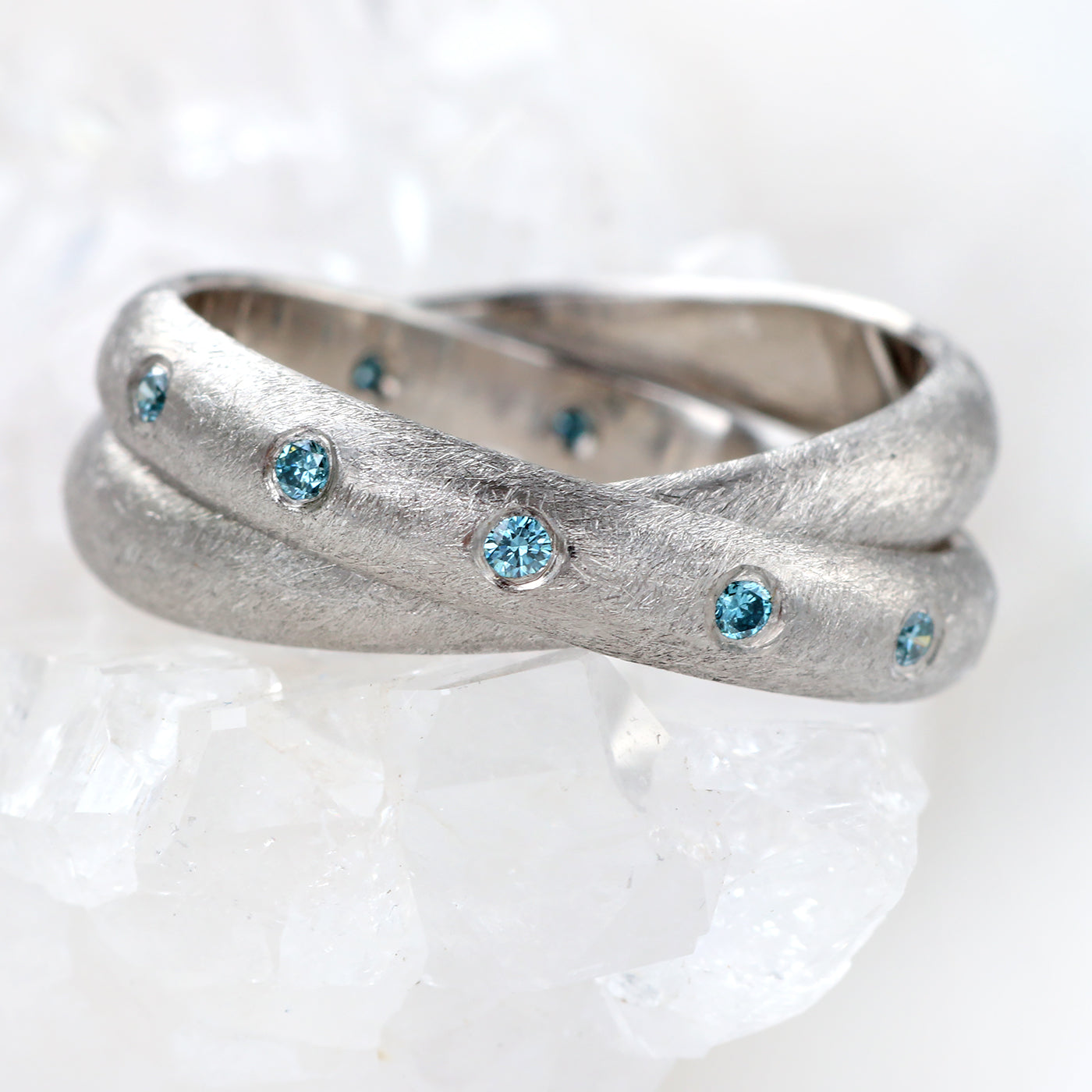 Bespoke Blue Diamond Rolling Ring in Platinum