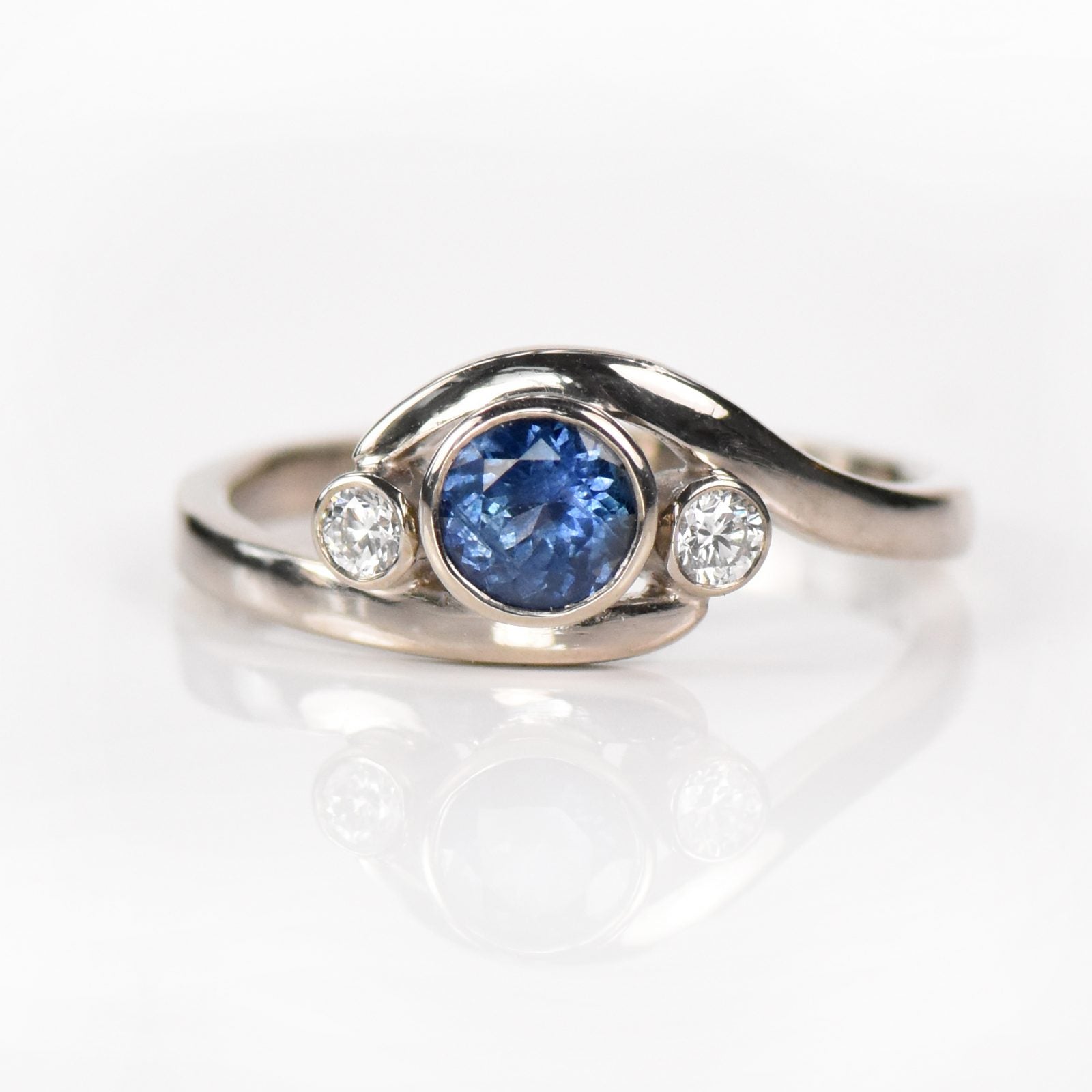 blue sapphire and diamond wave ring