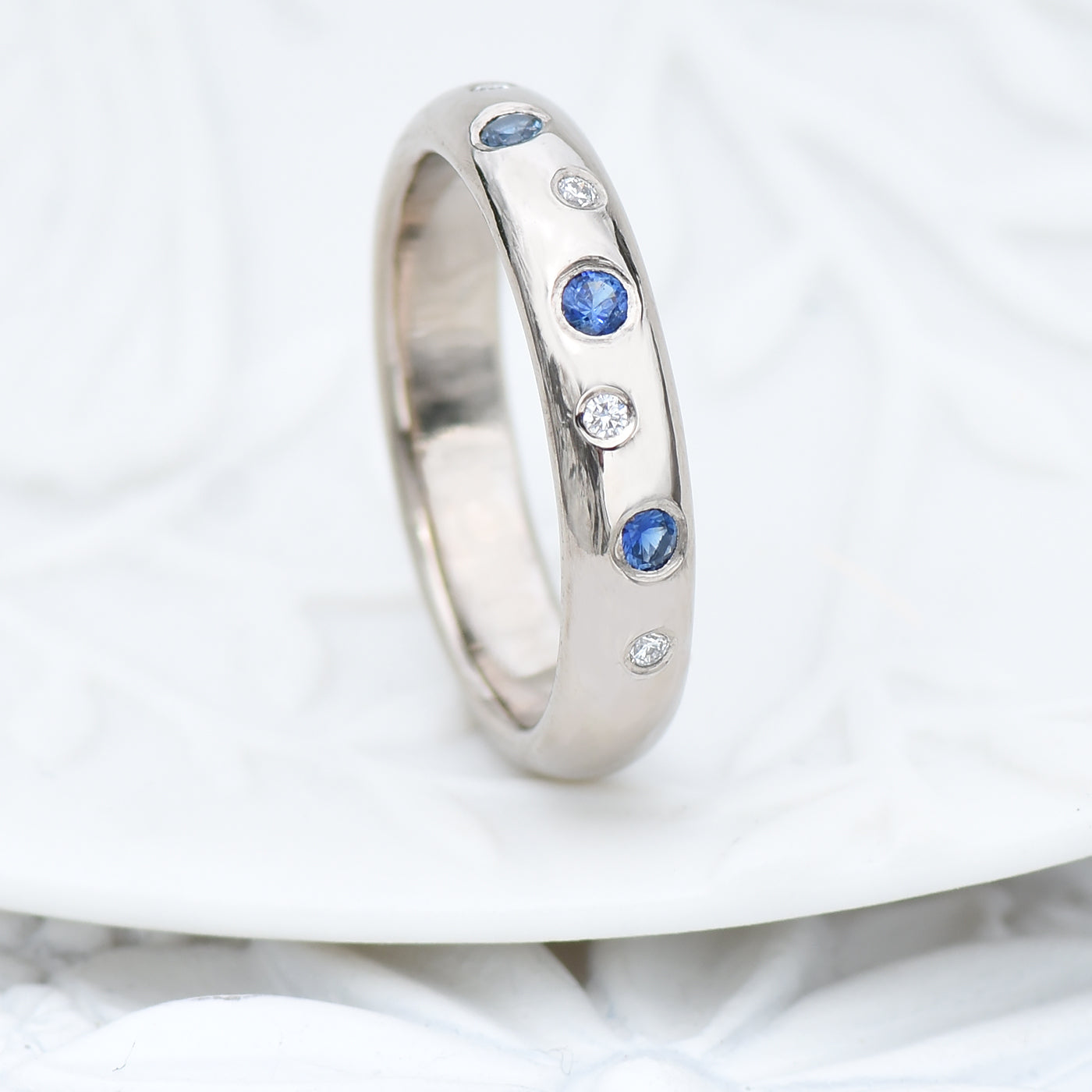 blue sapphire and diamond eternity band