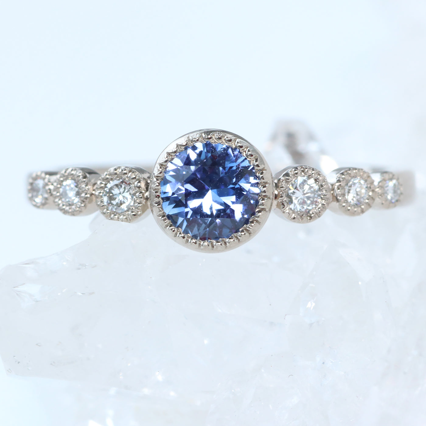 blue sapphire graduated diamond engagement ring