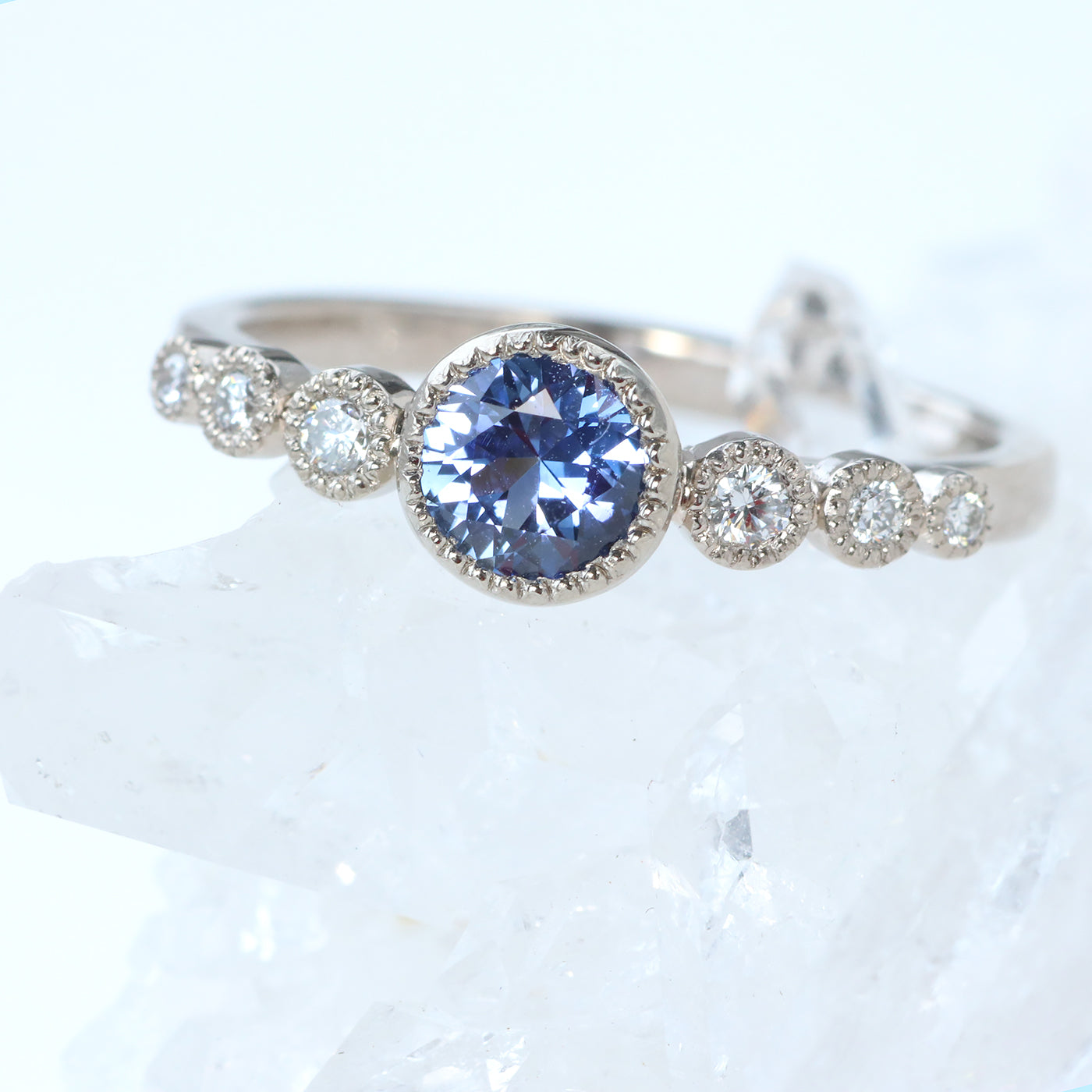 blue sapphire graduated diamond engagement ring
