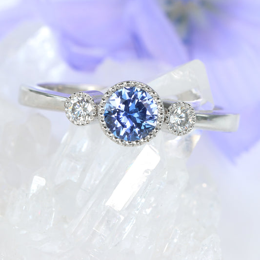Platinum Medium Blue Sapphire and Diamond Trilogy Engagement Ring
