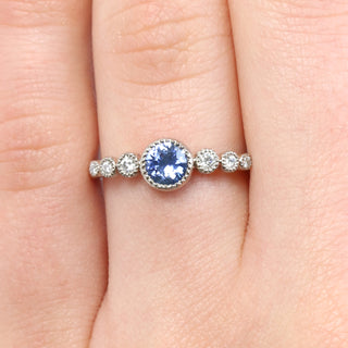 blue sapphire graduated diamond engagement ring