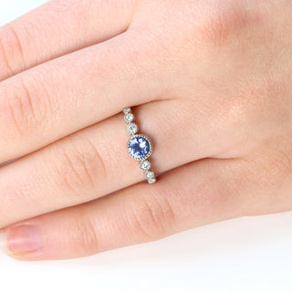 blue sapphire graduated diamond engagement ring