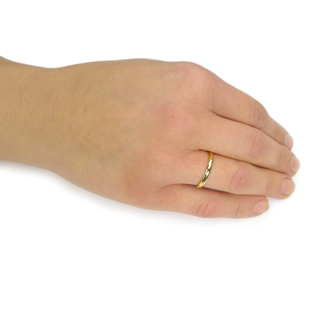 Comfort Fit Gold Wedding Ring on the hand