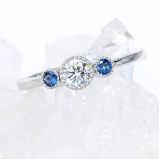 Custom Platinum Diamond and Sapphire Trilogy Ring