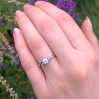 Custom Platinum Diamond and Sapphire Trilogy Ring