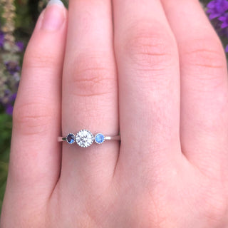 Custom Platinum Diamond and Sapphire Trilogy Ring