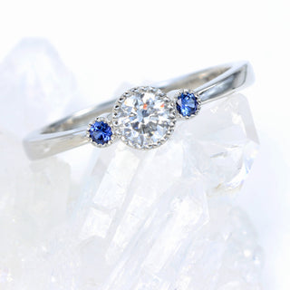 Custom Platinum Diamond and Sapphire Trilogy Ring
