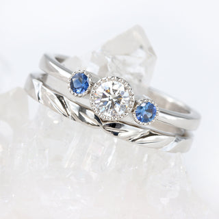 Custom Platinum Diamond and Sapphire Trilogy Ring
