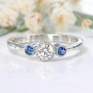 Custom Platinum Diamond and Sapphire Trilogy Ring