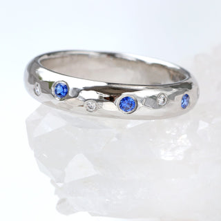 Scatter blue sapphire and diamond 18ct white gold wedding or eternity band