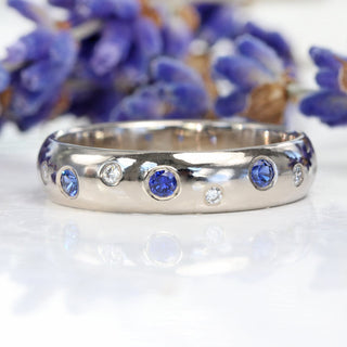 Blue sapphire and diamond 18ct white gold eternity band