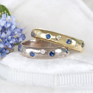 Sapphire and diamond eternity rings in 18ct yellow and white gold
