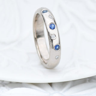 blue sapphire and diamond eternity band