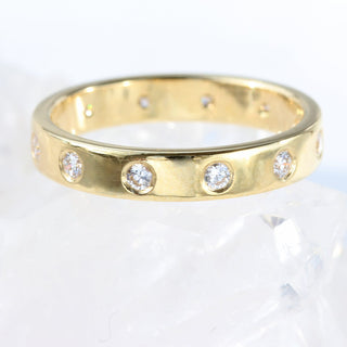Diamond eternity or wedding ring, handmade by Lilia Nash using 100% sustainable 18ct gold and fair trade diamonds