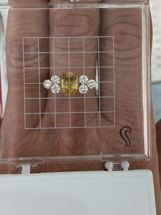 Luxury bespoke yellow sapphire cluster engagement ring with diamonds, handmade in Cornwall UK.