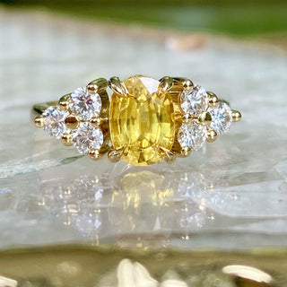 Luxury bespoke yellow sapphire and diamond engagement ring in 18ct gold UK.