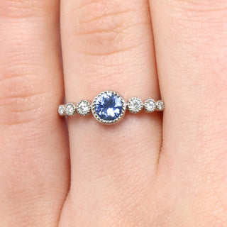 blue sapphire graduated diamond engagement ring