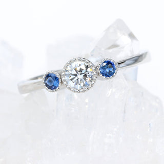 Custom Platinum Diamond and Sapphire Trilogy Ring