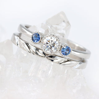 Custom Platinum Diamond and Sapphire Trilogy Ring