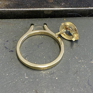 Custom Teal Sapphire and Diamond Halo Engagement Ring in 18ct Gold