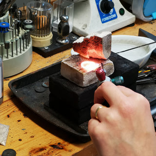 Custom Platinum Blue Sapphire and Diamond Wave Trilogy Ring