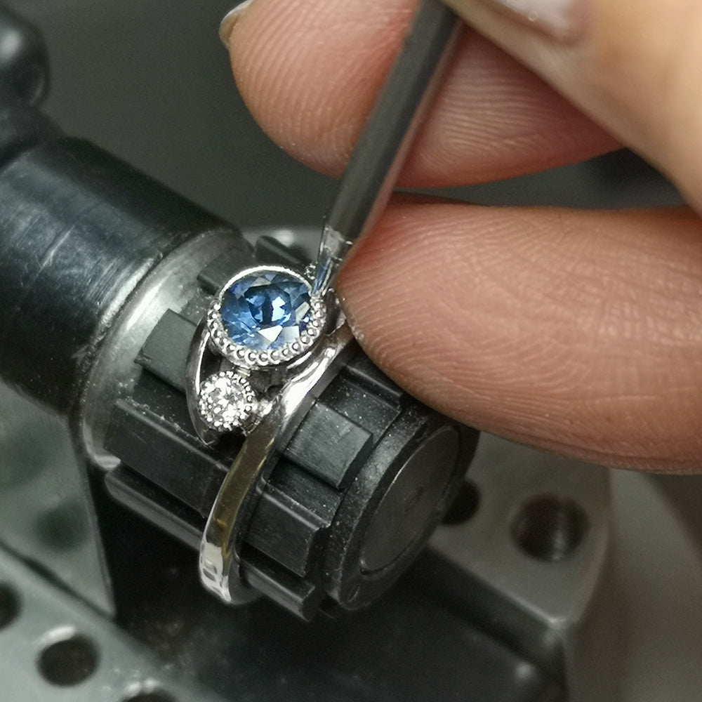 Platinum Blue Sapphire and Diamond Wave Trilogy Ring