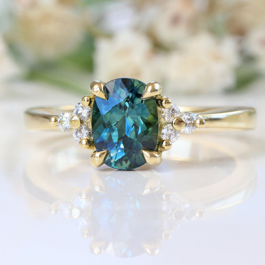 Oval Parti Sapphire & Diamond Cluster Engagement Ring