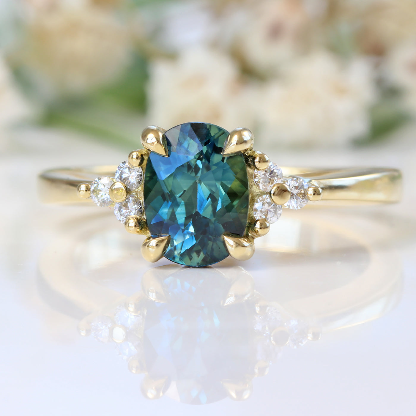 Oval Parti Sapphire & Diamond Cluster Engagement Ring