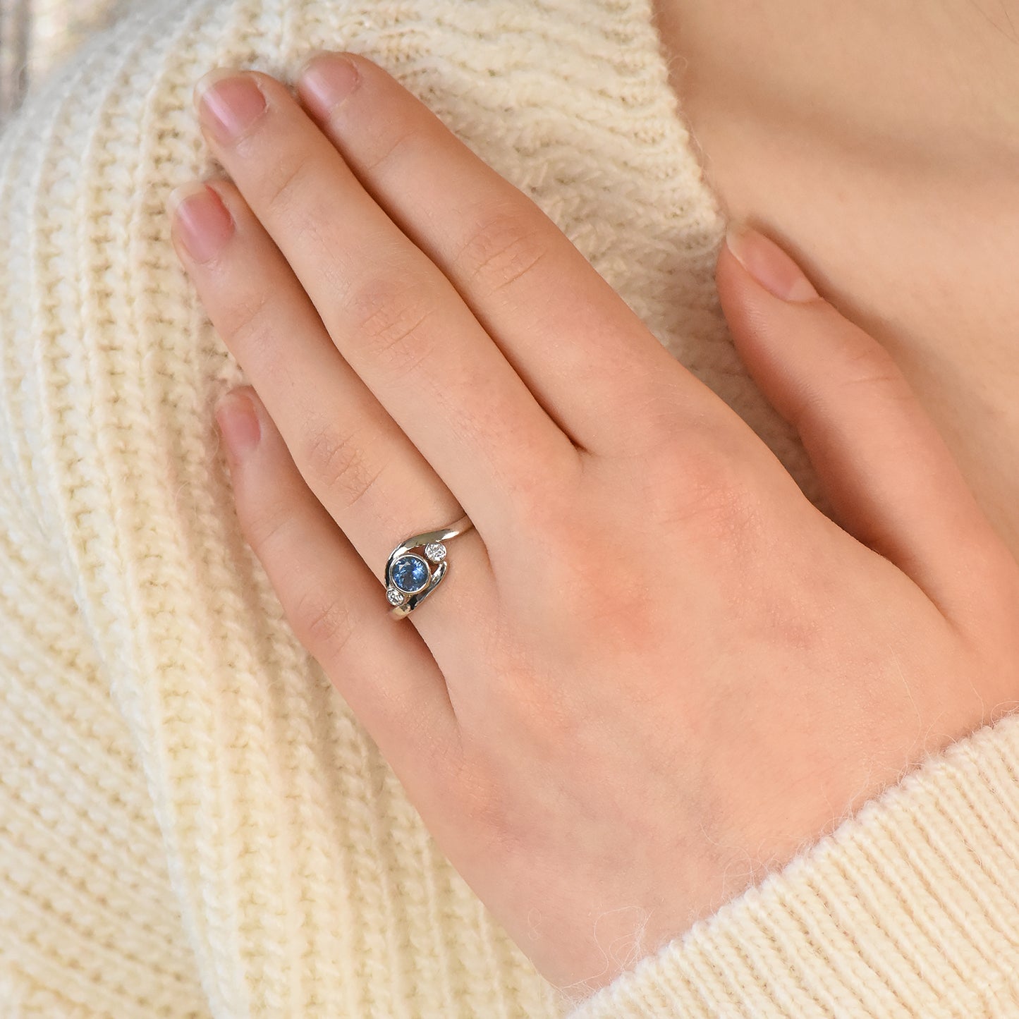 blue sapphire and diamond wave ring