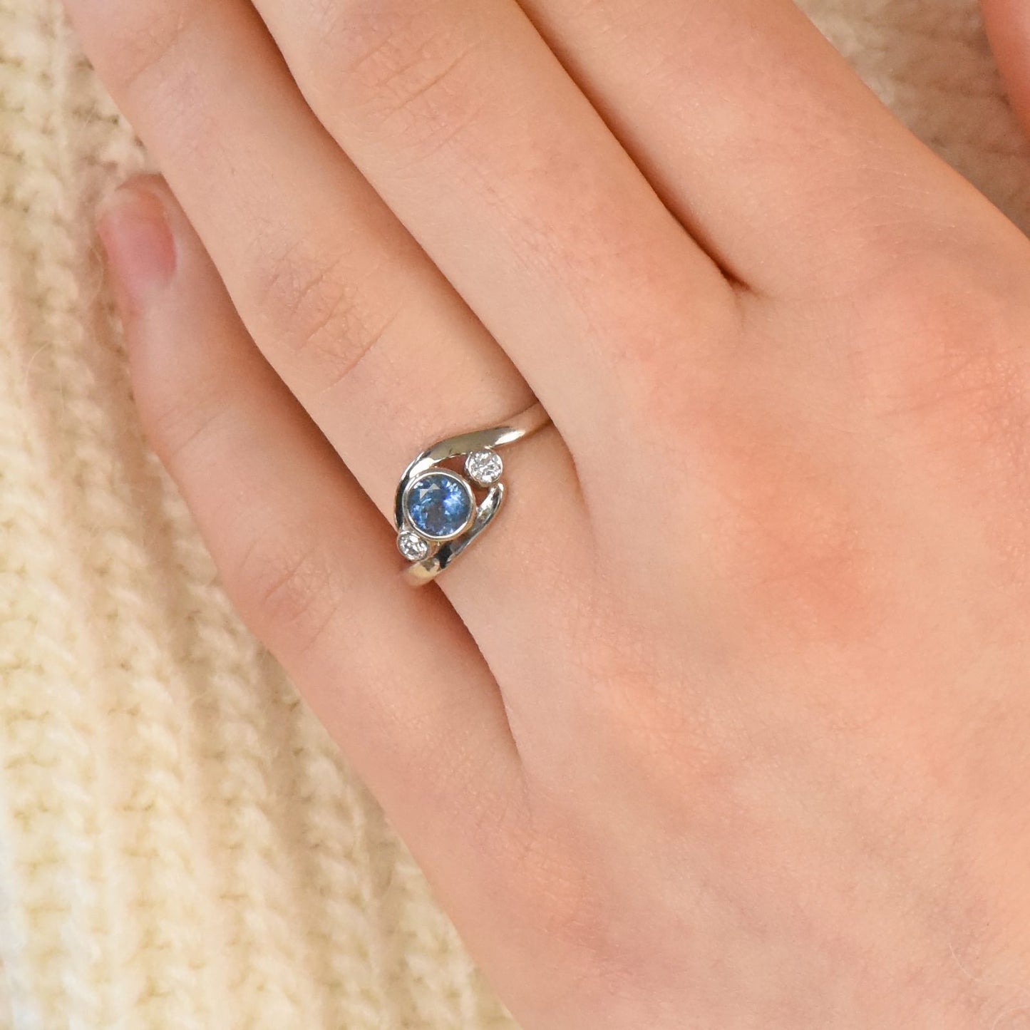 blue sapphire and diamond wave ring