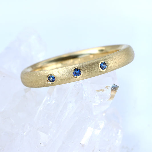 Custom Blue Sapphire Eternity/Wedding Band in 18ct Gold