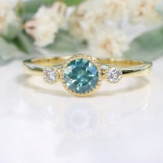 Gold Silky Teal Sapphire and Diamond Trilogy Engagement Ring
