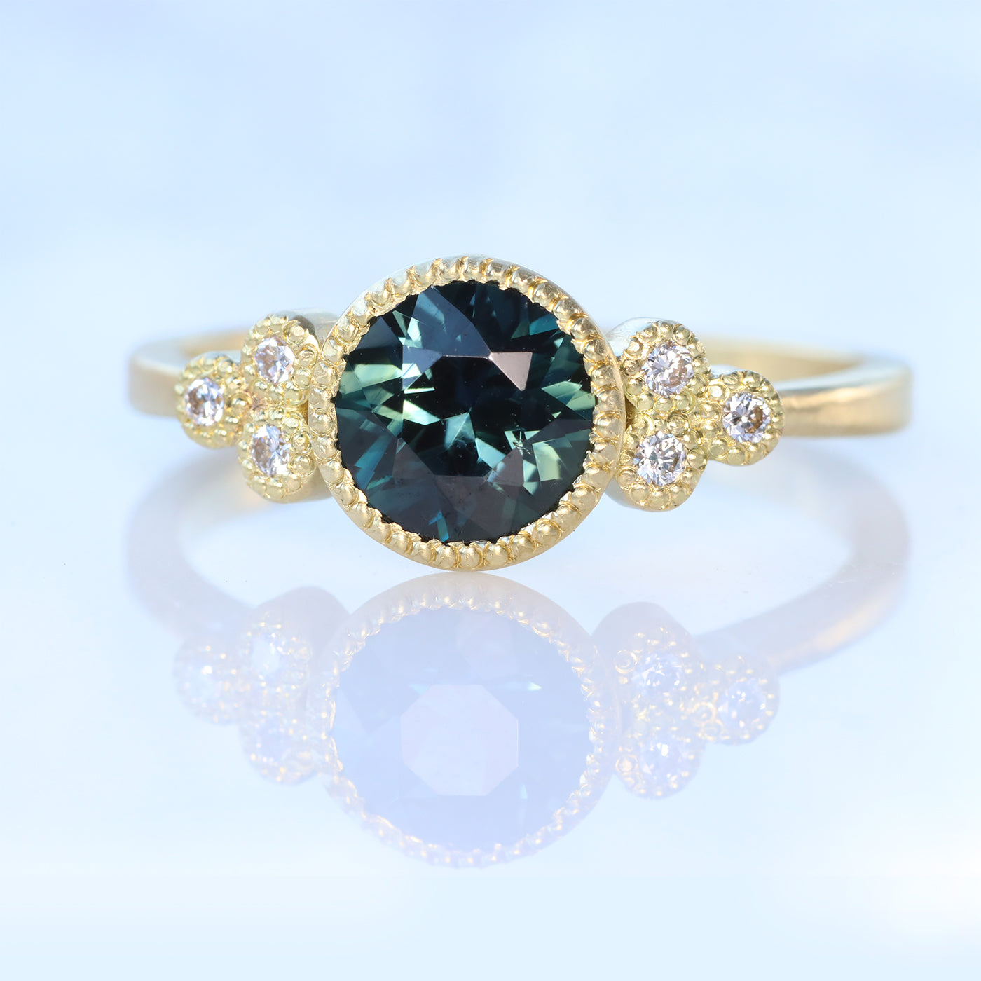 teal sapphire and diamond cluster ring